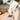 skincare cream being squeezed onto someone's hand