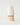 white and peach colored bottle of skincare