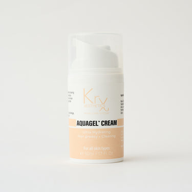 white and peach colored bottle of skincare