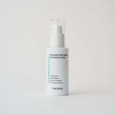 white skincare pump bottle with green label