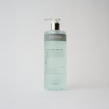 light blue skincare liquid in a pump bottle