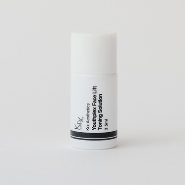 white bottle of toner