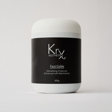 white bottle of face mask with black label