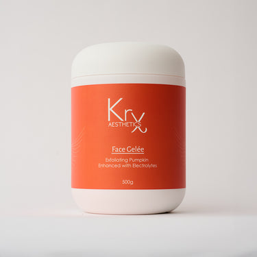 white cylinder container of face mask powder and orange label
