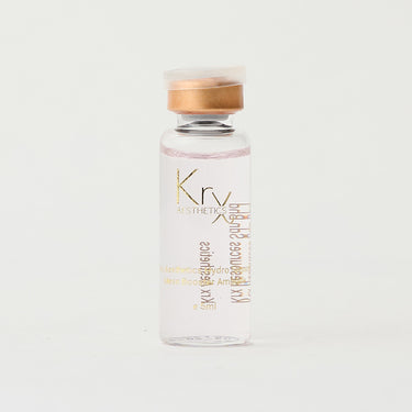 skincare solution in a glass vial