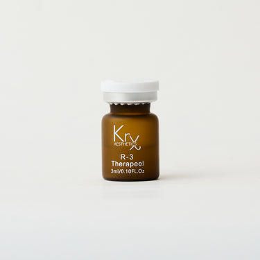 amber glass vial of skincare peel