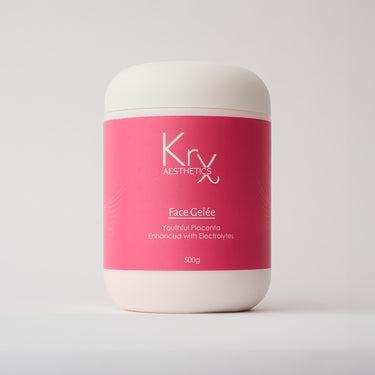 white bottle of face mask with a pink label