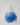a blue ball of body soap inside a mesh bag