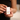 holding skincare product