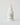 white dropper bottle of scalp serum 