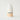 white and peach colored bottle of skincare