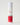 white bottle of skincare toner with a red label