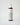 black pump bottle of facial cleanser with white label