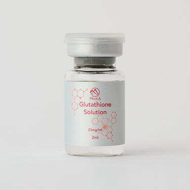 small clear vial of skincare solution