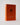 orange book with the letter H on the front