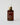 amber glass bottle with facial serum inside 