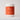 white cylinder container of face mask powder and orange label