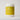 container of face mask with a yellow label