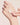 showing skincare texture on the back of someone's hand 